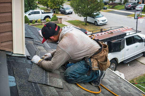 Professional Roofing technician working in Riverbank, CA